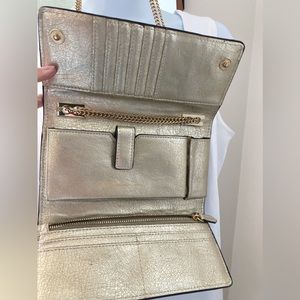 Wallet purse hold phone, credit cards and money.